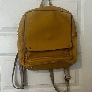 Chic Yellow Backpack with Patterned Interior